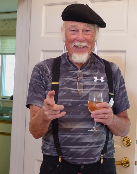 resident with glass of wine